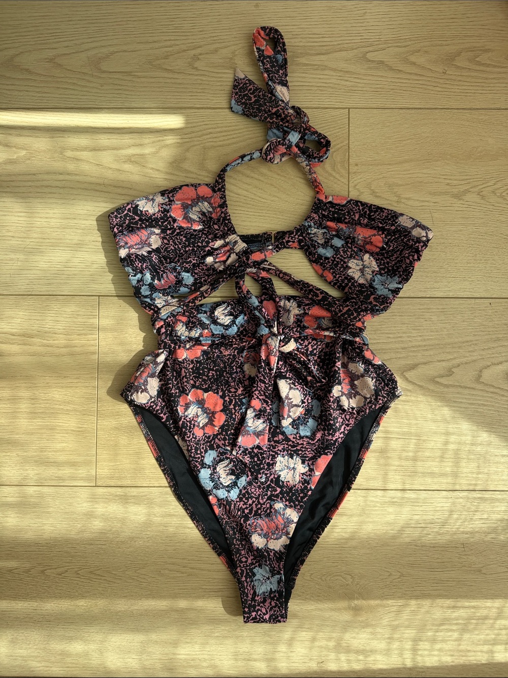 Cleobella Black Floral One-Piece Swimsuit with Coral and Blue Accents